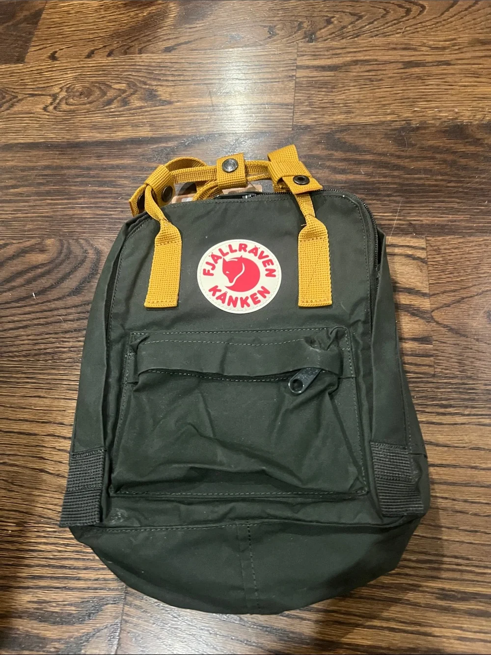 Fjallraven Kanken Mini Backpack in Dark Green with Yellow Straps